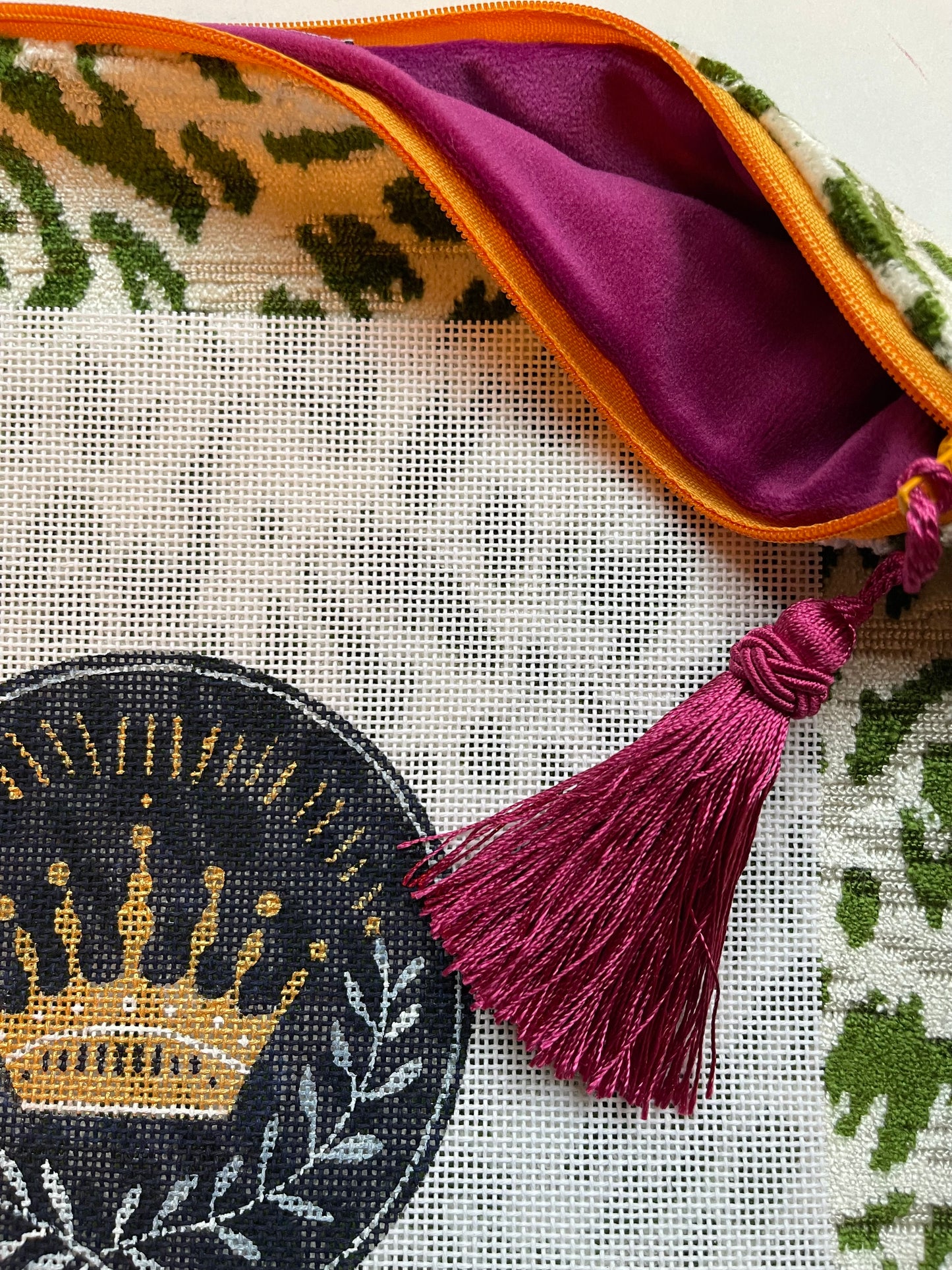 Anna Clutch #7: Crown canvas on green animal print patterned clutch